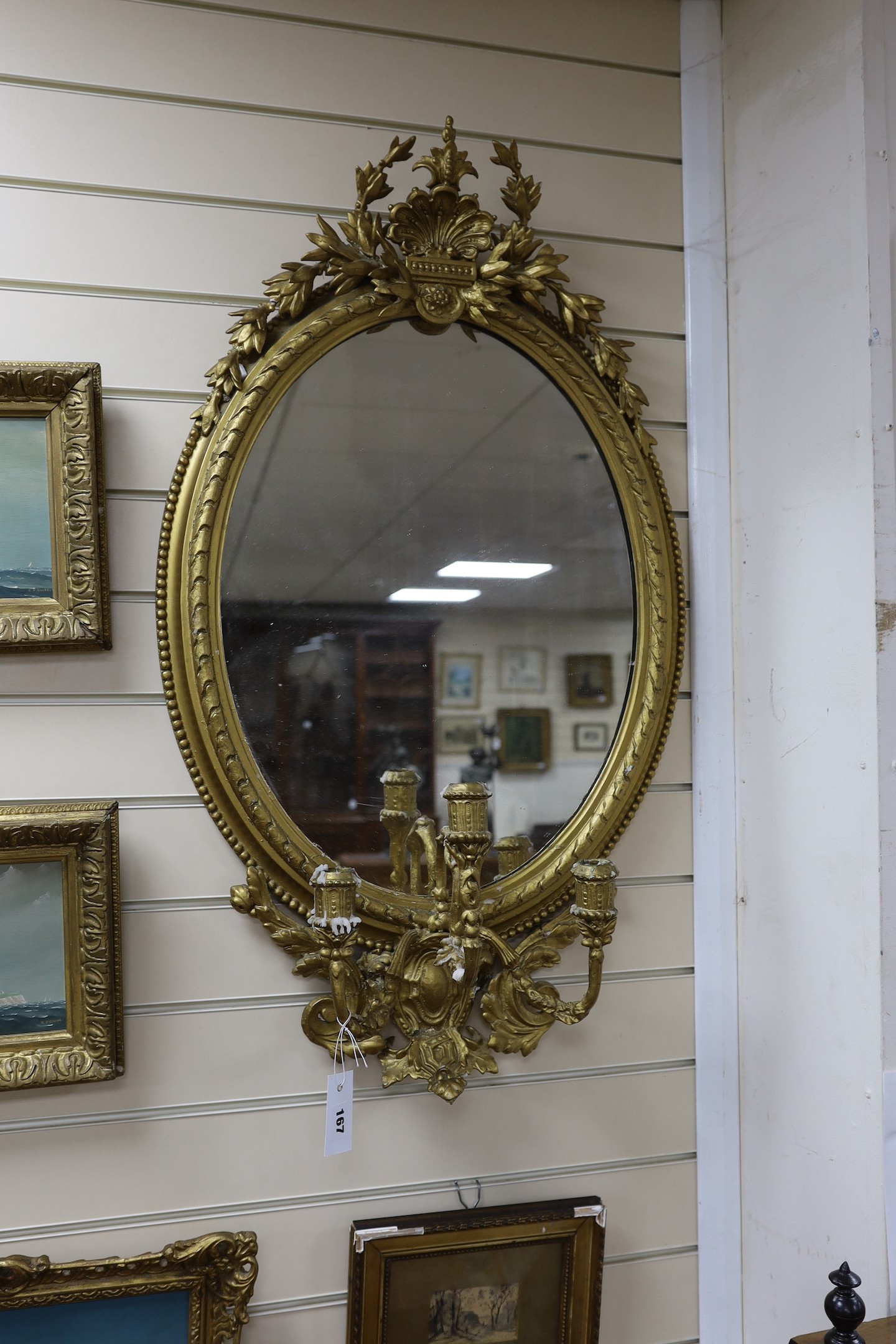 A Victorian giltwood and gesso girandole, width 56cm, height 96cm